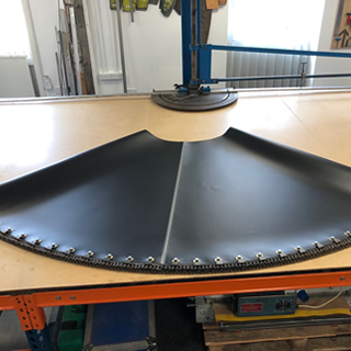 CHAIN DRIVEN BELTS